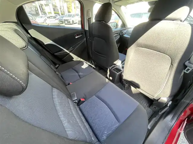 マツダ デミオ 13S 熊本県 2015(平27)年 9.5万km ソウルレッドプレミアムメタリック 純正ナビ/【ワンセグテレビ/Bluetooth/USB/AM/FM】/バックカメラ/ステアリングスイッチ/アイドリングストップ/横滑り防止/MTモード/プッシュスタート/HID/ヘッドライトレベライザー/スマートキー/スペアキー/ドアバイザー/取扱説明書