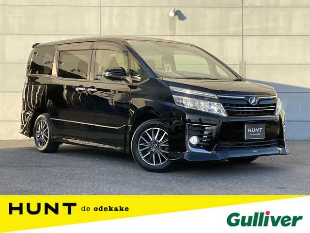 トヨタ ヴォクシー ZS 煌 千葉県 2015(平27)年 5.8万km ブラック 純正９インチナビ/・Bluetooth/フルセグTV/DVD/CD/ミュージックサーバー（SD）/アルパイン製フリップダウンモニター/ビルトインＥＴＣ/バックカメラ/両側パワースライドドア/純正アルミホイール/オートライト/ＴＲＤエアロ