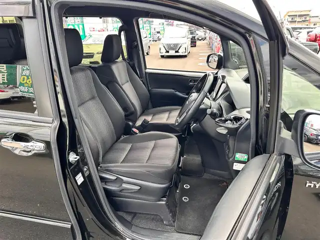トヨタ ヴォクシー ハイブリッド ZS 煌Ⅱ 宮城県 2019(平31)年 13.6万km イナズマスパーキングブラックガラスフレーク TRDエアロ（F/S/R）/セーフティセンス/・プリクラッシュセーフティ/・レーンディパーチャーアラート/・オートマチックハイビーム/・先行車発進お知らせ機能/インテリジェントクリアランスソナー/パーキングサポートブレーキ/社外10.2インチフリップダウンモニター（TMX-R3300）/社外9インチナビ（AVN-ZX03i）/・CD/DVD/・Bluetooth/・フルセグTV/バックカメラ/ETC/両側パワースライドドア/シートヒーター/革巻きステアリング/クルーズコントロール/ステアリングスイッチ/LEDヘッドランプ/フォグランプ/オートライト/スマートキー＆プッシュスタート/電動格納ミラー/純正16インチAW/純正ドアバイザー/フロアマット/Wエアバッグ