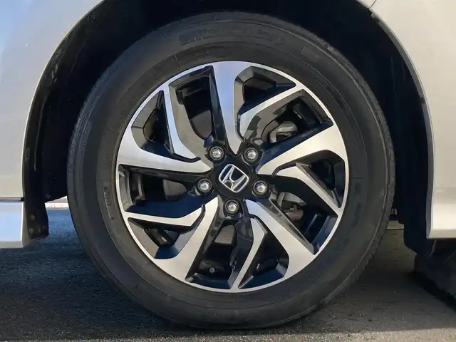 ホンダ ステップワゴン スパーダ ホンダセンシング 静岡県 2021(令3)年 5.4万km スーパープラチナメタリック HondaSENSING/純正9インチナビ(VXM-217VFNi)/　AM FM CD DVD Bluetooth SD USB AppleCarPlay/フルセグTV/LEDオートヘッドランプ/レーダークルーズコントロール/両側パワースライドドア/FABTECTシート/わくわくゲート/純正16インチアルミホイール/スマートキー2本/パドルシフト/リアサンシェード/純正フロアマット(前席ラバーマット付)/ワンオーナー/ビルトインETC2.0/バックモニター