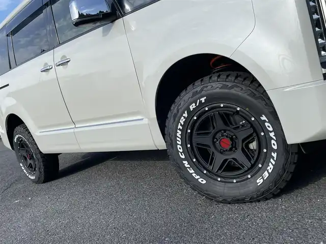 三菱 デリカＤ：５ P 千葉県 2020(令2)年 5.9万km ウォームホワイトパール AIS検査済み社外パーツ取付済み/【4WD ディーゼル 8人乗り】/ワンオーナー/オートステップ/リフトアップキット（社外）/ＪＡＯＳフロントバンパーガード（社外）/マドリスグリル（社外）/純正大型液晶メモリナビ/（フルセグTV/Bluetooth Audio/Music Catcher/HDMI）/フリップダウンモニター/マルチアラウンドビューモニター/クルーズコントロール/プッシュスタート/スマートキー/両側パワースライドドア/パワーバックドア/ETC/ルーフビームガーニッシュ