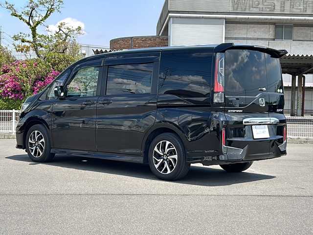 ホンダ ステップワゴン スパーダ ホンダセンシング 岡山県 2017(平29)年 7.3万km プレミアムスパークルブラックパール 純正ナビＶＸＭ－１８５ＶＦＮｉ　ＢＴ／ＣＤ／ＤＶＤ／フルセグ　全方位カメラ　ホンダセンシング　ターボ　両側パワスラ　２列目分割ベンチシート　追従クルコン　パドルシフト　カーテンエアバッグ　ＬＥＤ