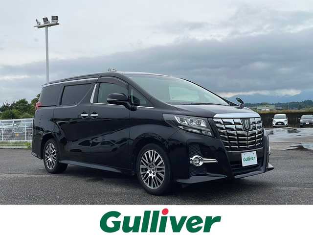 トヨタ アルファード S Cパッケージ 富山県 2017(平29)年 6.1万km ブラック 4WD/プリクラッシュセーフティ/レーダークルーズコントロール/両側パワースライドドア/パワーバックドア/Alpine車種専用ナビ（BIG X （型式：EX11V））/フルセグ/12型フリップダウンモニター（Alpine製）/バックカメラ/ETC/ウッドコンビステアリング/ハーフレザーシート/前席パワーシート