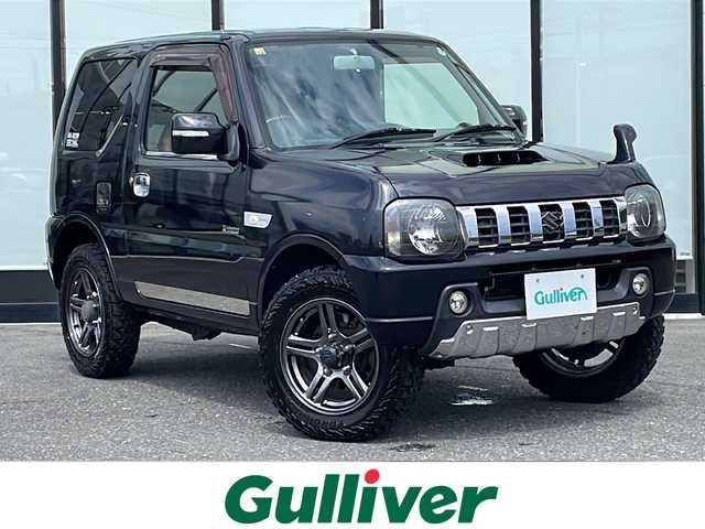 スズキ ジムニー クロスアドベンチャー 山形県 2012(平24)年 9.5万km ブルーイッシュブラックパール3 ４WD/水冷直列3気筒DOHC12バルブICターボ/純正SDナビ/（AM/FM/CD/DVD/BT/TV）/運転席シートヒーター/純正フロアマット/純正AW/ドアバイザー/フォグランプ/フロアマット純正/リモコンキー