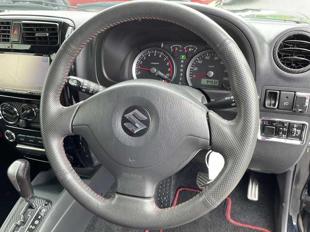スズキ ジムニー クロスアドベンチャー 山形県 2012(平24)年 9.5万km ブルーイッシュブラックパール3 ４WD/水冷直列3気筒DOHC12バルブICターボ/純正SDナビ/（AM/FM/CD/DVD/BT/TV）/運転席シートヒーター/純正フロアマット/純正AW/ドアバイザー/フォグランプ/フロアマット純正/リモコンキー