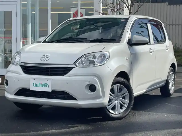 トヨタ パッソ X Lパッケージ 道央・札幌 2023(令5)年 7.5万km パールホワイトⅢ ・４WD/・衝突軽減システム/・盗難防止装置/・寒冷地仕様/・バックカメラ/・メモリナビ/・Bluetooth/・ワンセグTV/・プッシュスタート/・パーキングアシスト/・シートヒーター/・コーナーセンサー/・オートライト/・オートハイビーム/・アイドリングストップ/・LEDヘッドライト/・スマートキー/・ドアバイザー