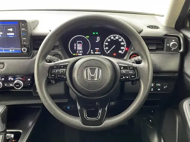 ホンダ ヴェゼル ハイブリッド e:HEV X 道央・札幌 2022(令4)年 6.3万km サンドカーキパール ・４WD/・寒冷地仕様/・純正ナビゲーション/　CD/DVD/BT/フルセグ/iPod/SD/・ビルトインETC/・社外ドライブレコーダー前後/・バックカメラ/・衝突軽減ブレーキ/・横滑り防止装置/・レーダークルーズコントロール/・レーンキープアシスト/・前後コーナーセンサー/・前席シートヒーター/・オートライト/・オートマチックハイビーム/・LEDヘッドライト/・パドルシフト/・ダウンヒルアシストコントロール/・純正フロアマット/・プッシュスタート/・スマートキー/・純正AW16インチ/・ステアリングスイッチ
