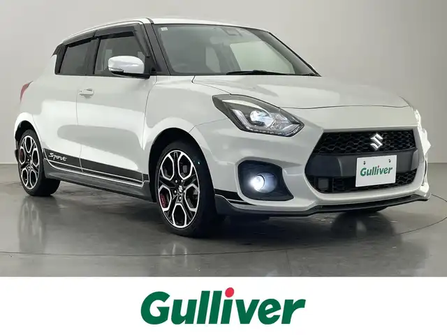スズキ スイフト スポーツ セーフティPKG 愛知県 2018(平30)年 9.1万km ピュアホワイトP 純正ナビ　シートヒーター　禁煙　ＭＴ車　フルセグＴＶ　Ｂｌｕｅｔｏｏｔｈ　デュアルセンサーブレーキ　衝突軽減　追従クルコン　車線逸脱　ＥＴＣ　ナビ連動ドラレコ　ＬＥＤオートライト　純正フロアマット