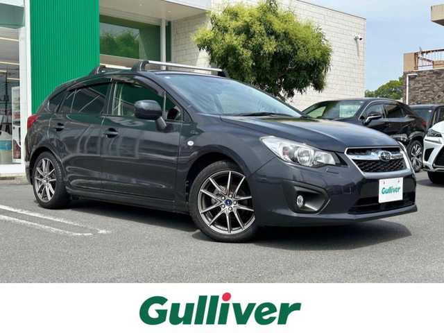 スバル インプレッサ スポーツ 1．6i－L 静岡県 2012(平24)年 7.2万km ダークグレーメタリック エンジンスタートボタン/パワーステアリング/パワーウィンドウ/アイドリングストップ/スマートキー/オートエアコン/Bluetooth/純正ETC/TV（フルセグ）/SDナビ/純正フロアマット/布シート/ルーフレール/アルミホイール（レオニス）/ABS/横滑り防止装置/カーテンエアバック/ヒルスタートアシストシステム