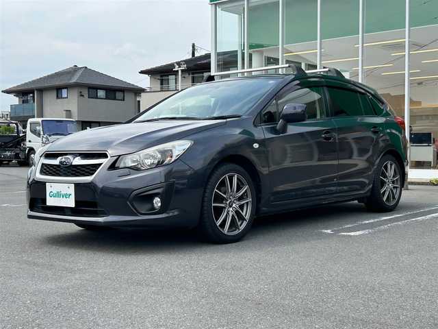 スバル インプレッサ スポーツ 1．6i－L 静岡県 2012(平24)年 7.2万km ダークグレーメタリック エンジンスタートボタン/パワーステアリング/パワーウィンドウ/アイドリングストップ/スマートキー/オートエアコン/Bluetooth/純正ETC/TV（フルセグ）/SDナビ/純正フロアマット/布シート/ルーフレール/アルミホイール（レオニス）/ABS/横滑り防止装置/カーテンエアバック/ヒルスタートアシストシステム