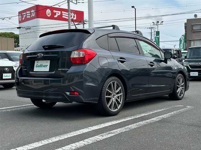 スバル インプレッサ スポーツ 1．6i－L 静岡県 2012(平24)年 7.2万km ダークグレーメタリック エンジンスタートボタン/パワーステアリング/パワーウィンドウ/アイドリングストップ/スマートキー/オートエアコン/Bluetooth/純正ETC/TV（フルセグ）/SDナビ/純正フロアマット/布シート/ルーフレール/アルミホイール（レオニス）/ABS/横滑り防止装置/カーテンエアバック/ヒルスタートアシストシステム