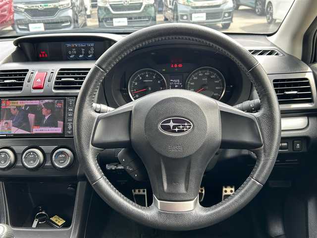 スバル インプレッサ スポーツ 1．6i－L 静岡県 2012(平24)年 7.2万km ダークグレーメタリック エンジンスタートボタン/パワーステアリング/パワーウィンドウ/アイドリングストップ/スマートキー/オートエアコン/Bluetooth/純正ETC/TV（フルセグ）/SDナビ/純正フロアマット/布シート/ルーフレール/アルミホイール（レオニス）/ABS/横滑り防止装置/カーテンエアバック/ヒルスタートアシストシステム