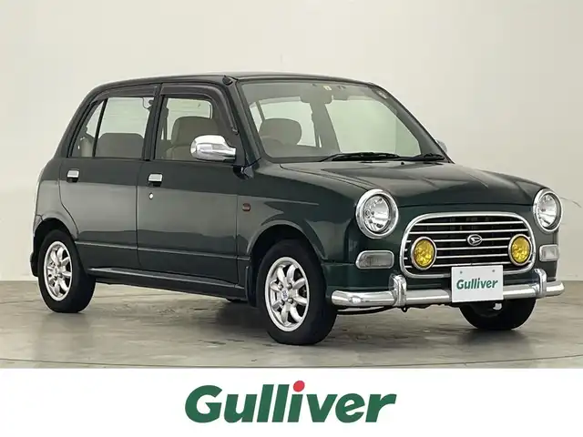 ダイハツ ミラ ジーノ 滋賀県 2002(平14)年 10.8万km ブリティッシュグリーンマイカ 禁煙車/純正オーディオ/（CD/カセットテープ/AM/FM）/前後ドライブレコーダー/ETC/社外フロアマット/社外アルミホイール/純正ドアバイザー/ウッドコンビステアリング/フォグランプ/スペアキー