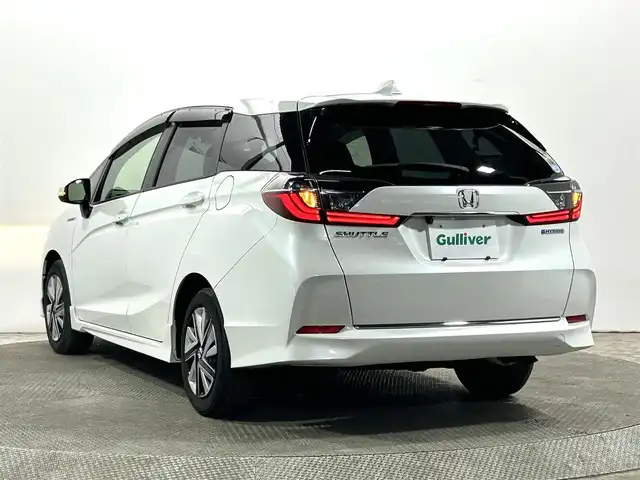 ホンダ シャトル ハイブリッド ホンダセンシング 大阪府 2021(令3)年 3.5万km プラチナホワイトパール 社外ナビ(地デジ/DVD再生/Bluetooth) バックカメラ ETC 衝突軽減 レーダークルコン レーンアシスト オートライト オートエアコン スマートキー プッシュスタート 横滑り防止