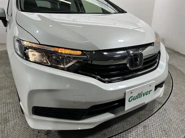 ホンダ シャトル ハイブリッド ホンダセンシング 大阪府 2021(令3)年 3.5万km プラチナホワイトパール 社外ナビ(地デジ/DVD再生/Bluetooth) バックカメラ ETC 衝突軽減 レーダークルコン レーンアシスト オートライト オートエアコン スマートキー プッシュスタート 横滑り防止