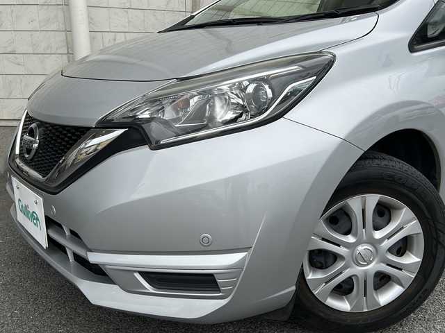 日産 ノート X 神奈川県 2018(平30)年 0.9万km ブリリアントシルバー 純正ディーラーナビ(CD/AUX/BT/ワンセグTV)/衝突被害軽減ブレーキ/レーンキープアシスト/横滑り防止装置/アイドリングストップ/プッシュスタート/オートライト/ステアリングスイッチ/ISOFIX/スペアキー×１/ワンオーナー/保証書