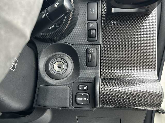 トヨタ ＦＪクルーザー 富山県 2014(平26)年 2.4万km ホワイト 4WD/純正SDナビ（NSZT-W62G）/フルセグ/Bluetooth/バックカメラ/サイドカメラ/ドライブレコーダー/ETC/クリアランスソナー/クルーズコントロール/リフトアップ/BFグッドリッチ オールテレーン（275/55/R20）/JAOSマッドフラップ/オーバーフェンダーキット/背面タイヤ/社外20インチアルミホイール/社外マフラー
