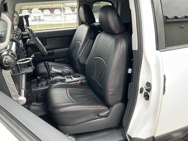 トヨタ ＦＪクルーザー 富山県 2014(平26)年 2.4万km ホワイト 4WD/純正SDナビ（NSZT-W62G）/フルセグ/Bluetooth/バックカメラ/サイドカメラ/ドライブレコーダー/ETC/クリアランスソナー/クルーズコントロール/リフトアップ/BFグッドリッチ オールテレーン（275/55/R20）/JAOSマッドフラップ/オーバーフェンダーキット/背面タイヤ/社外20インチアルミホイール/社外マフラー