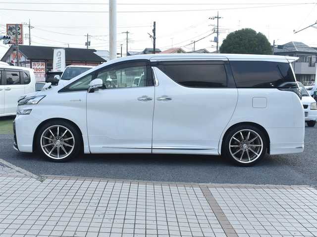 トヨタ ヴェルファイア ハイブリット X 神奈川県 2015(平27)年 5.2万km ホワイトパールクリスタルシャイン ワンオーナー/社外メモリナビ/フルセグテレビ/両側パワースライドドア/モデリスタエアロ/社外２０インチAW/社外足廻り/ETC/LEDヘッドライト/保証書/スペアスマートキー