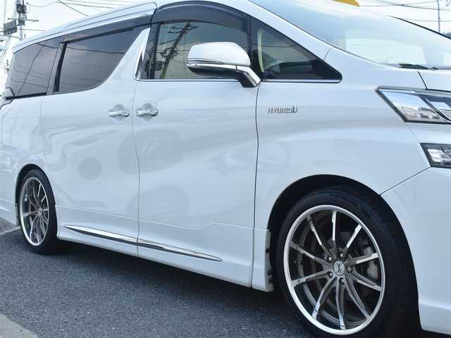 トヨタ ヴェルファイア ハイブリット X 神奈川県 2015(平27)年 5.2万km ホワイトパールクリスタルシャイン ワンオーナー/社外メモリナビ/フルセグテレビ/両側パワースライドドア/モデリスタエアロ/社外２０インチAW/社外足廻り/ETC/LEDヘッドライト/保証書/スペアスマートキー