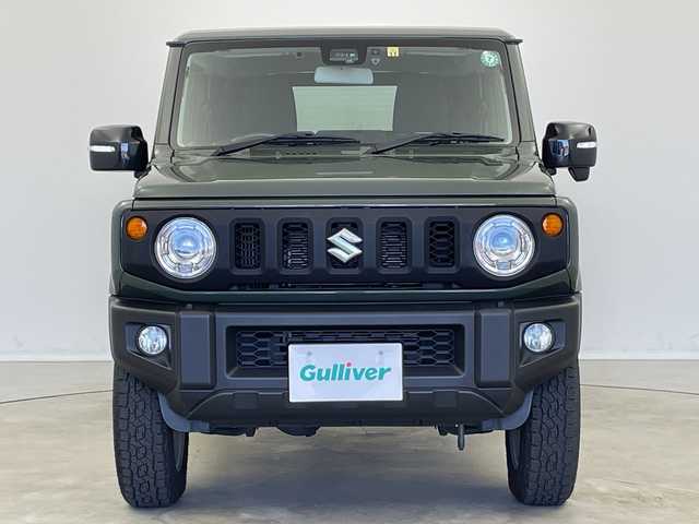 スズキ ジムニー XC 新潟県 2022(令4)年 5万km ジャングルグリーン 4WD/スズキセーフティサポート/　　・デュアルセンサーブレーキサポート/　　・誤発進抑制機能/　　・車線維持支援システム/　　・ふらつき警報機能/　　・ハイビームアシスト/　　・先行車発進お知らせ機能/　　・標識認識機能/クルーズコントロール/ヒルディセントコントロール/純正8インチナビ　　/　　（CD/DVD/BT/フルセグTV）/バックカメラ/ドライブレコーダー/ホワイトレタータイヤ/ビルトインETC/革巻きステアリング/ステアリングリモコン/シートヒーター（前席）/電動格納ウィンカーミラー/ミラーヒーター/純正LEDヘッドライト/フォグランプ/取扱説明書/保証書