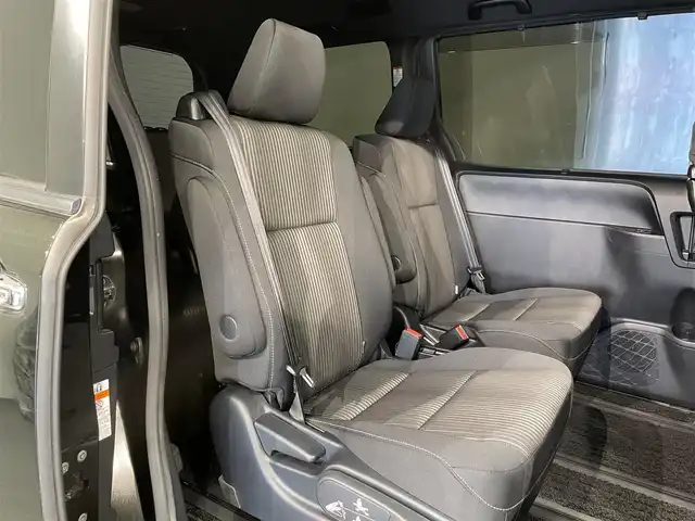 トヨタ ヴォクシー ZS 煌 愛知県 2018(平30)年 5.6万km イナズマスパーキングブラックガラスフレーク 純正10インチナビ/フルセグ/両側電動スライドドア/トヨタセーフティセンス/禁煙車/ドライブレコーダー/バックカメラ/純正16インチアルミ/後期モデル/LEDヘッドライト/フォグランプ/オートライト/オートハイビーム/クルーズコントロール/キーレス/ドライブレコーダー/電動格納ミラー/アイドリングストップ/ビルトインETC/プッシュスタート/Wエアコン/純正フロアマット