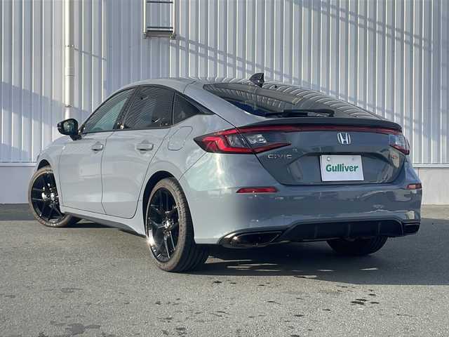 ホンダ シビック RS 三重県 2024(令6)年 1.3万km ソニックグレーパール 純正ナビ/バックカメラ/BSM/ビルトインETC2.0/ワイヤレス充電器/パワーシート/シートヒーター/タイプC給電/コーナーセンサー/レーダークルーズコントロール/レーンキープアシスト/革巻きステアリング/ステアリングスイッチ/電動格納ミラー/禁煙車
