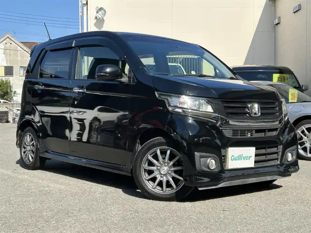 ホンダ Ｎ ＷＧＮ カスタム G Aパッケージ 和歌山県 2015(平27)年 6.6万km スマートブラック 純正ナビ(ワンセグTV/CD/DVD/FM/AM/SD/Bluetooth/USB/MUSIC RACK)/ワンオーナー/バックカメラ/アイドリングストップ/横滑り防止装置/CTBA/クルーズコントロール/ハーフレザーシート/プッシュスタート/ベンチシート/純正アルミホイール/純正フロアマット/純正ドアバイザー/取扱説明書/保証書