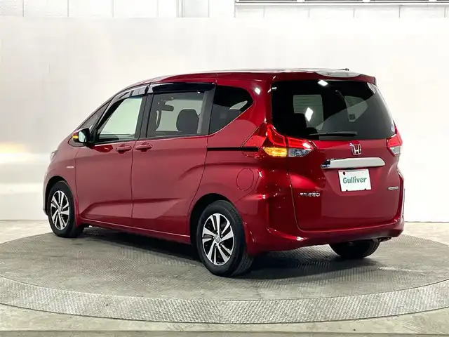 ホンダ フリード ハイブリット G センシング 大阪府 2018(平30)年 4.7万km プレミアムクリスタルレッドM 純正ナビ(フルセグ/DVD再生/Bluetooth) バックカメラ ETC 両側パワースライドドア 衝突軽減 レーダークルコン クリアランスソナー ハーフレザー 前後ドラレコ プッシュスタート