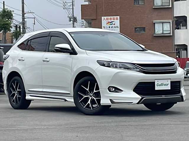トヨタ ハリアー プレミアム スタイルアッシュ 山口県 2017(平29)年 4.6万km ホワイトパールクリスタルシャイン モデリスタエアロ　/電動リアゲート　/クルーズコントロール　/ハーフレザーシート　/社外ナビ（Bluetooth/フルセグTV/DVD)/バックカメラ/前席シートヒーター/ＥＴＣ　/純正１８インチアルミ　/アイドリングストップ　/オートハイビーム　/パワーシート　/車線逸脱警報/横滑り防止装置
