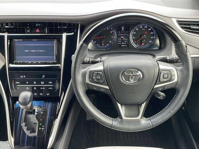 トヨタ ハリアー プレミアム スタイルアッシュ 山口県 2017(平29)年 4.6万km ホワイトパールクリスタルシャイン モデリスタエアロ　/電動リアゲート　/クルーズコントロール　/ハーフレザーシート　/社外ナビ（Bluetooth/フルセグTV/DVD)/バックカメラ/前席シートヒーター/ＥＴＣ　/純正１８インチアルミ　/アイドリングストップ　/オートハイビーム　/パワーシート　/車線逸脱警報/横滑り防止装置