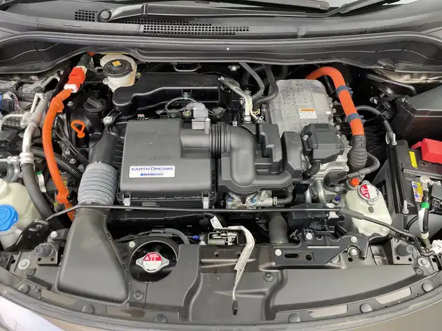 ホンダ フィット e:HEVリュクス 三重県 2021(令3)年 5.4万km プレミアムグラマラスブロンズP 禁煙車/純正9インチナビ/　フルセグTV/CD/DVD/Bluetooth/純正アルミホイール/前席シートヒーター/革巻きステアリング/スマートキー/レーダークルーズコントロール/衝突軽減ブレーキシステムシステム/AAC/ETC/前方ドラレコ/オートライト/プッシュスタート/純正LEDヘッドライト