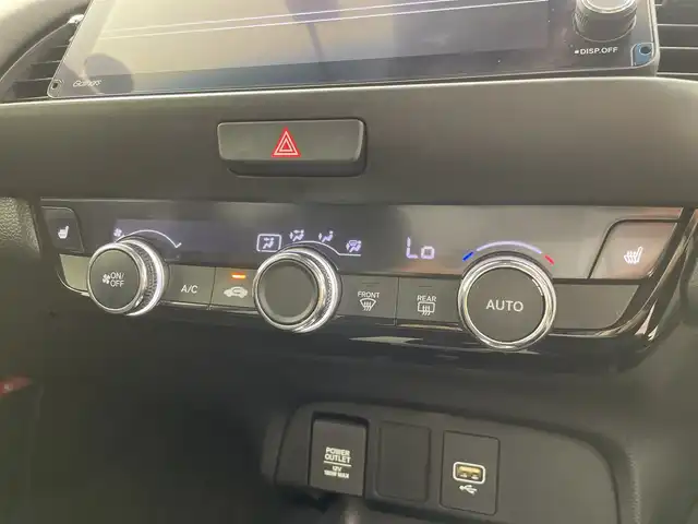 ホンダ フィット e:HEVリュクス 三重県 2021(令3)年 5.4万km プレミアムグラマラスブロンズP 禁煙車/純正9インチナビ/　フルセグTV/CD/DVD/Bluetooth/純正アルミホイール/前席シートヒーター/革巻きステアリング/スマートキー/レーダークルーズコントロール/衝突軽減ブレーキシステムシステム/AAC/ETC/前方ドラレコ/オートライト/プッシュスタート/純正LEDヘッドライト