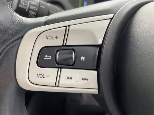 ホンダ フィット e:HEVリュクス 三重県 2021(令3)年 5.4万km プレミアムグラマラスブロンズP 禁煙車/純正9インチナビ/　フルセグTV/CD/DVD/Bluetooth/純正アルミホイール/前席シートヒーター/革巻きステアリング/スマートキー/レーダークルーズコントロール/衝突軽減ブレーキシステムシステム/AAC/ETC/前方ドラレコ/オートライト/プッシュスタート/純正LEDヘッドライト