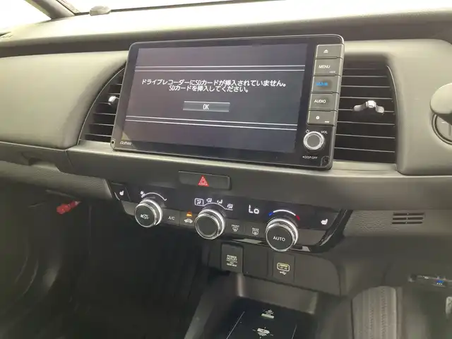 ホンダ フィット e:HEVリュクス 三重県 2021(令3)年 5.4万km プレミアムグラマラスブロンズP 禁煙車/純正9インチナビ/　フルセグTV/CD/DVD/Bluetooth/純正アルミホイール/前席シートヒーター/革巻きステアリング/スマートキー/レーダークルーズコントロール/衝突軽減ブレーキシステムシステム/AAC/ETC/前方ドラレコ/オートライト/プッシュスタート/純正LEDヘッドライト