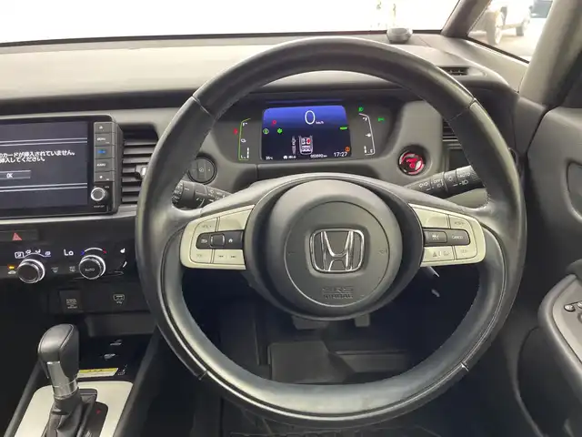 ホンダ フィット e:HEVリュクス 三重県 2021(令3)年 5.4万km プレミアムグラマラスブロンズP 禁煙車/純正9インチナビ/　フルセグTV/CD/DVD/Bluetooth/純正アルミホイール/前席シートヒーター/革巻きステアリング/スマートキー/レーダークルーズコントロール/衝突軽減ブレーキシステムシステム/AAC/ETC/前方ドラレコ/オートライト/プッシュスタート/純正LEDヘッドライト