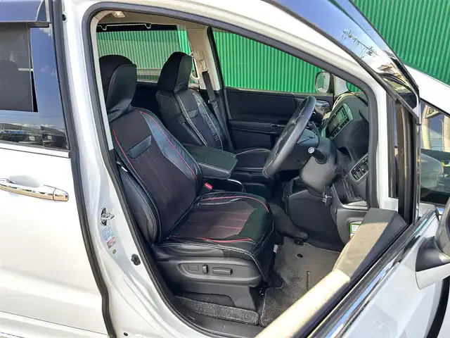 ホンダ オデッセイ ハイブリッド アブソルートセンシングEXパック 宮城県 2016(平28)年 13.1万km ホワイトオーキッドパール Hondaインターナビ＋リンクアップフリー＋ETC車載器（ナビ連動）/マルチビューカメラシステム＋スマートパーキングアシストシステ/＝＝＝/ホンダセンシング/●衝突軽減ブレーキ 〈CMBS〉/●歩行者事故低減ステアリング/●ACC 〈アダプティブ・クルーズ・コントロール〉/●LKAS 〈車線維持支援システム〉/●路外逸脱抑制機能/●誤発進抑制機能/●先行車発進お知らせ機能/●標識認識機能/ブラインドスポットインフォメーション/純正フリップダウンモニター/Hondaインターナビ/【CD/DVD/HDMI/SD/USB/IPOD】/AC100V/1500W/両側パワースライドドア/ハーフレザーシート/運転席パワーシート/WORK18インチアルミホイール/TEIN車高調/TEIN EDFC ACTIVE PRO/LEDヘッドライト/LEDフォグランプ/サンシェード/ステアリングスイッチ/ドアバイザー/純正フロアマット/保証書/取扱説明書/スペアキー/TVキット/純正サスペンション積込