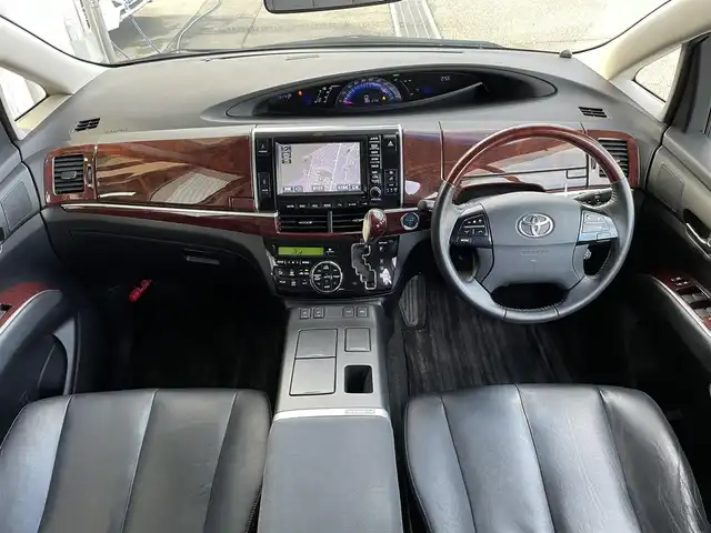 トヨタ エスティマ ハイブリッド アエラス レザーパッケージ 東京都 2013(平25)年 7.6万km ブラック 純正ナビ　/　TV　フルセグ　CD　DVD　Bluetooth/電動格納サードシート　/電動パワーシート　/シートヒーター　/電動リアゲート　/両側電動スライドドア　/ＥＴＣ　/全周囲カメラ　/クルーズコントロールシステム　/純正フロアマット　/純正サイドバイザー/ABS/横滑り防止装置/レーンアシスト/盗難防止装置/オートライト/衝突被害軽減ブレーキ