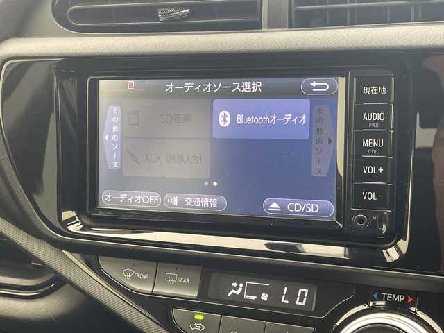 トヨタ アクア S スタイルブラック 沖縄県 2017(平29)年 7.5万km ライムホワイトパールクリスタルシャイン 禁煙車　/純正ナビ【NSCD-W66】　/(フルセグＴＶ　DVD ＢＬＵＥＴＯＯＴＨ　ＡＵＸ　ＳＤ)　　/バックモニター　/ビルトインＥＴＣ　/ドライブレコーダー/トヨタセーフティセンス　/・衝突被害軽減ブレーキ (プリクラッシュセーフティ)																																																																										/・車線はみ出しアラート (レーンディパーチャーアラート)																									/・自動ハイビーム (オートマチックハイビーム)																									/社外15インチアルミホイール　/オートライト/プッシュスタート/スマートキー/ドアバイザー