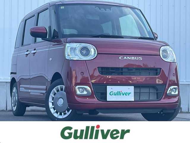 ダイハツ ムーヴ キャンバス セオリー G 愛媛県 2022(令4)年 0.5万km ファイアークォーツレッドM KENWOODナビ　/CD/DVD/フルセグＴＶ/バックカメラ　/両側パワースライドドア　/Ｄ／Ｎ席シートヒーター　/衝突被害軽減装置　/車線逸脱防止装置　/ＬＥＤヘッドライト　/ステアリングスイッチ　/電動パーキングブレーキ　/前後コーナーセンサー/フォグランプ/電格ミラー/純正ホイールキャップ/現状サマー(鉄)(155/65/R14)