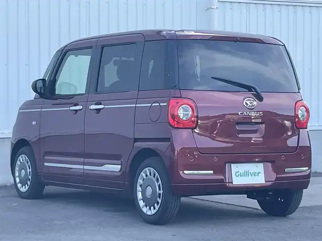 ダイハツ ムーヴ キャンバス セオリー G 愛媛県 2022(令4)年 0.5万km ファイアークォーツレッドM KENWOODナビ　/CD/DVD/フルセグＴＶ/バックカメラ　/両側パワースライドドア　/Ｄ／Ｎ席シートヒーター　/衝突被害軽減装置　/車線逸脱防止装置　/ＬＥＤヘッドライト　/ステアリングスイッチ　/電動パーキングブレーキ　/前後コーナーセンサー/フォグランプ/電格ミラー/純正ホイールキャップ/現状サマー(鉄)(155/65/R14)
