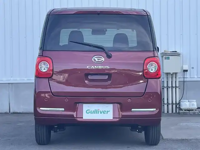 ダイハツ ムーヴ キャンバス セオリー G 愛媛県 2022(令4)年 0.5万km ファイアークォーツレッドM KENWOODナビ　/CD/DVD/フルセグＴＶ/バックカメラ　/両側パワースライドドア　/Ｄ／Ｎ席シートヒーター　/衝突被害軽減装置　/車線逸脱防止装置　/ＬＥＤヘッドライト　/ステアリングスイッチ　/電動パーキングブレーキ　/前後コーナーセンサー/フォグランプ/電格ミラー/純正ホイールキャップ/現状サマー(鉄)(155/65/R14)