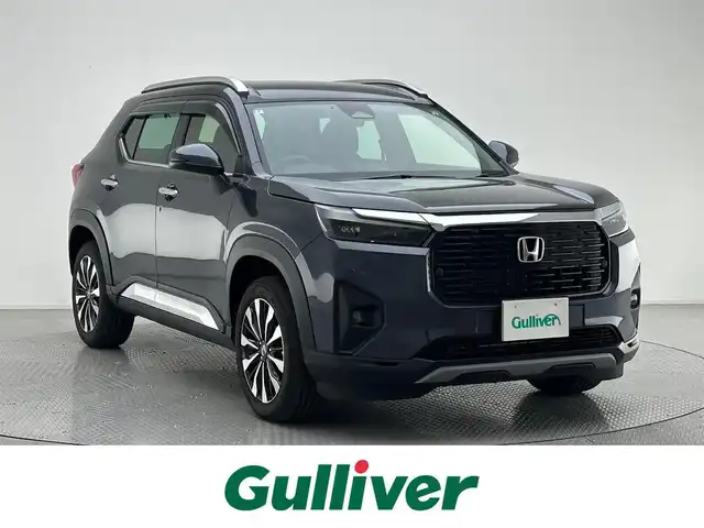 ホンダ ＷＲ－Ｖ Z+ 兵庫県 2024(令6)年 0.6万km メテオロイドグレーメタリック 純正9インチメモリナビ/（フルセグTV/Bluetooth/スマホ連携）/純正ディスプレイオーディオ/バックカメラ/コーナーセンサー（前後）/プリクラッシュセーフティー/アダクティブクルーズコントロール/横滑り防止装置/LKA/盗難防止装置/カーテンエアバッグ/ハーフレザーシート/LEDフォグランプ/LEDヘッドライト/オートライト/ヘッドライトレベライザー/ビルトインETC/純正17インチアルミホイール/純正フロアマット/スマートキー/ルーフレール