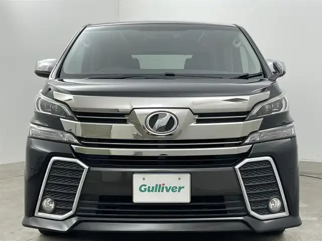 トヨタ ヴェルファイア Z Aエディション 岡山県 2016(平28)年 6.4万km ブラック ALPINE10インチナビ/・FM/AM/Bluetooth/フルセグ/CD/DVD/・バックカメラ/・TVキャンセラー/10.1インチフリップダウンモニター(ALPINE)/プリクラッシュセーフティシステム/クリアランスソナー＆バックソナー/クルーズコントロール/両側パワースライドドア/前方ドライブレコーダー/ビルトインETC/MTモード付シフト/ドアバイザー/純正18インチアルミ/純正フロアマット/LEDヘッドライト/ドアバイザー/オートブレーキホールド/TVキャンセラー/ステアリングスイッチ/チルトステアリング/シートリフター/ウインカーミラー/ナビ取扱説明書