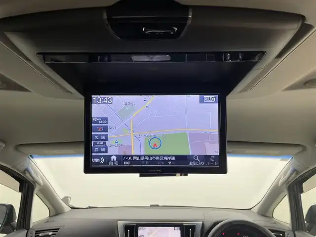 トヨタ ヴェルファイア Z Aエディション 岡山県 2016(平28)年 6.4万km ブラック ALPINE10インチナビ/・FM/AM/Bluetooth/フルセグ/CD/DVD/・バックカメラ/・TVキャンセラー/10.1インチフリップダウンモニター(ALPINE)/プリクラッシュセーフティシステム/クリアランスソナー＆バックソナー/クルーズコントロール/両側パワースライドドア/前方ドライブレコーダー/ビルトインETC/MTモード付シフト/ドアバイザー/純正18インチアルミ/純正フロアマット/LEDヘッドライト/ドアバイザー/オートブレーキホールド/TVキャンセラー/ステアリングスイッチ/チルトステアリング/シートリフター/ウインカーミラー/ナビ取扱説明書