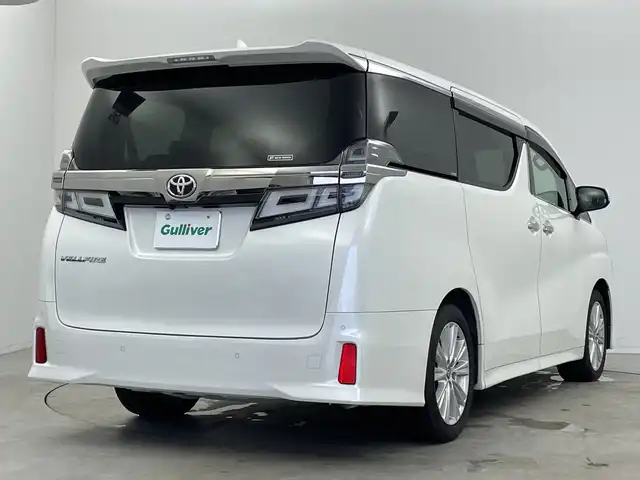 トヨタ ヴェルファイア Z Aエディション 新潟県 2019(令1)年 8万km ホワイトパールクリスタルシャイン 純正ディラーOP10インチナビ/Bluetooth/フルセグTV/純正12インチフリップダウンモニター/バックモニター/デジタルインナーミラー/ETC/トヨタセーフティセンス/ブラインドスポットモニター/パーキングアシスト/追従型クルーズコントロール/両側パワースライドドア/LEDヘッドライト/オートライト/オートハイビーム/純正18インチホイール/スペアキー
