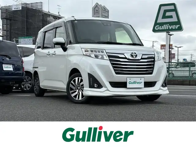 トヨタ ルーミー カスタムG 大分県 2019(令1)年 5万km パールホワイトⅢ ナビ/ETC/バックカメラ/両側パワースライドドア/クルーズコントロール/Bluetooth接続/フルセグTV/プッシュスタート/スマートキー/アイドリングストップ/純正フロアマット/純正14インチアルミホイール/横滑り防止装置/オートライト/コーナーセンサー