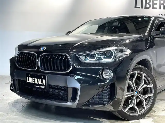 ＢＭＷ Ｘ２ xDrive20i MスポーツX 道央・札幌 2018(平30)年 1.9万km サファイアブラックP ドライビング・アシスト・プラス/・ACC/ドライビング・アシスト/・レーン・ディパーチャー・ウォーニング/・前車接近警告機能/・衝突回避。被害軽減ブレーキ/リアビューカメラ/LEDヘッドライト/オートライト/シートヒーター（D/N）/パワーテールゲート/パドルシフト/純正１９インチAW/純正フロアマット/前後ドライブレコーダー/アンビエントライト/BMWヘッドアップディスプレイ/HDDナビ/ETC