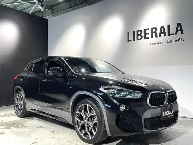 ＢＭＷ Ｘ２ xDrive20i MスポーツX 道央・札幌 2018(平30)年 1.9万km サファイアブラックP ドライビング・アシスト・プラス/・ACC/ドライビング・アシスト/・レーン・ディパーチャー・ウォーニング/・前車接近警告機能/・衝突回避。被害軽減ブレーキ/リアビューカメラ/LEDヘッドライト/オートライト/シートヒーター（D/N）/パワーテールゲート/パドルシフト/純正１９インチAW/純正フロアマット/前後ドライブレコーダー/アンビエントライト/BMWヘッドアップディスプレイ/HDDナビ/ETC