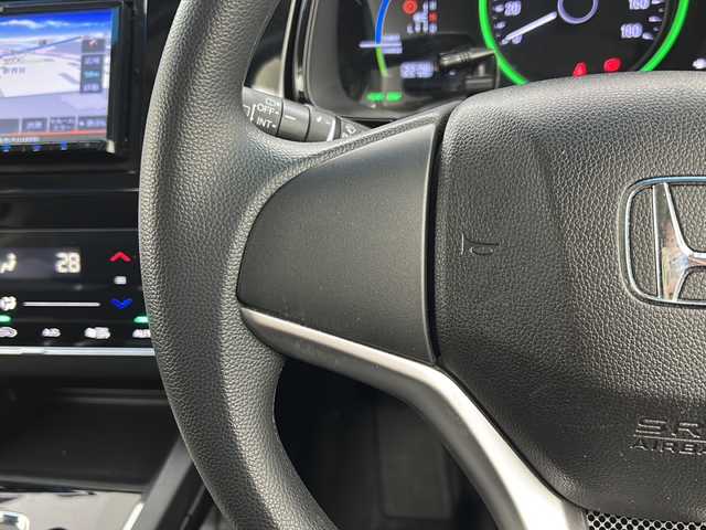 ホンダ シャトル ハイブリッド ホンダセンシング 宮城県 2020(令2)年 7.7万km プラチナホワイトパール 禁煙車/ホンダセンシング/・路外逸脱抑制機能/・衝突軽減ブレーキ/・オートクルーズコントロール/社外7インチナビ/・BT.CD.DVD.USB.SD.AUX/バックカメラ/社外ETC/プッシュスタート/スマートキー/スペアー（1本）/ステアリングスイッチ/ドアバイザー/アイドリングストップ/横滑り防止機能/ヘッドライトレベライザー